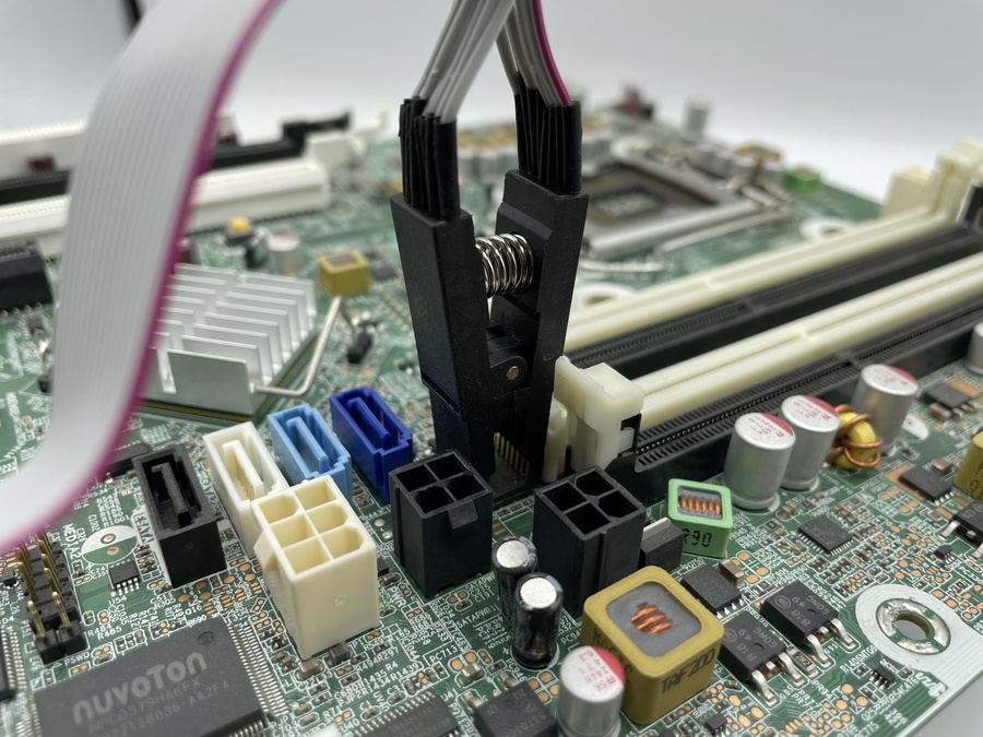 Image of 16-Pin Chip Clip attached to the BIOS Chip of a HP 8300