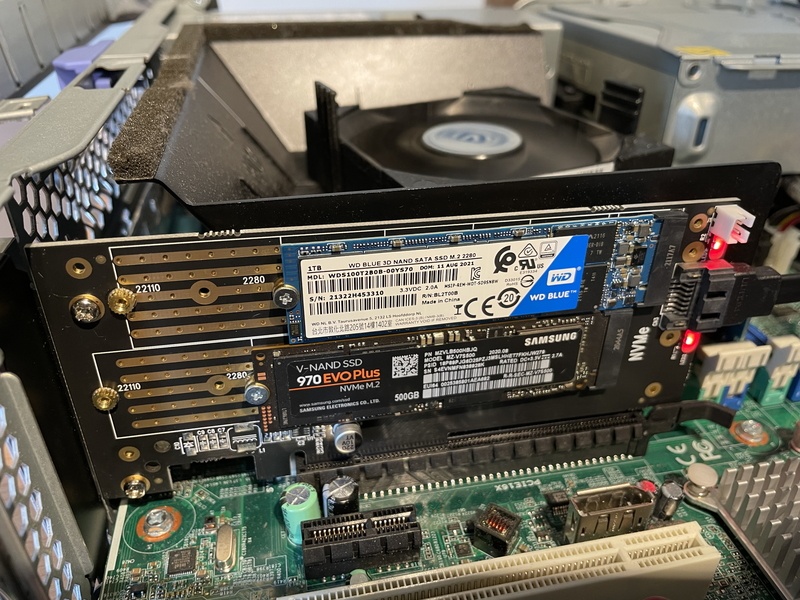 Image of Dual M.2 PCIe Adapter installed into a Lenovo M92 Small. The drive is populated with one SATA SSD and one NVMe SSD.