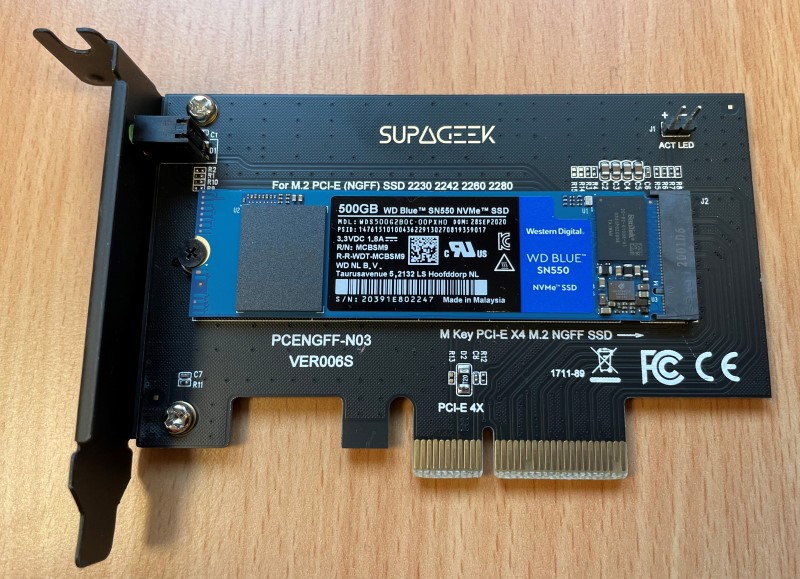 NVMe Solid State Drive installed onto a PCIe adapter for installation into an OptiPlex 7010.